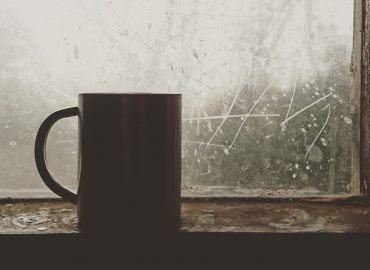Coffee mug by window